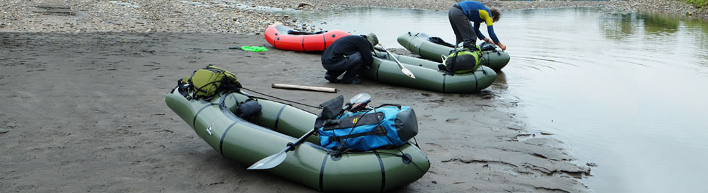 Gearing up and rigging packrafts at Atalaya, Manu National Park