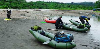 Gearing Up Packrafts Near Atalaya in Manu National Park